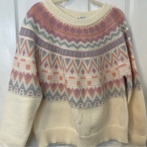 Cream sweater with pastel designs